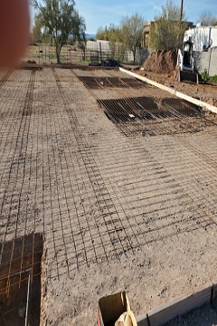 Reinforcing steel and foundation work on a prepared site